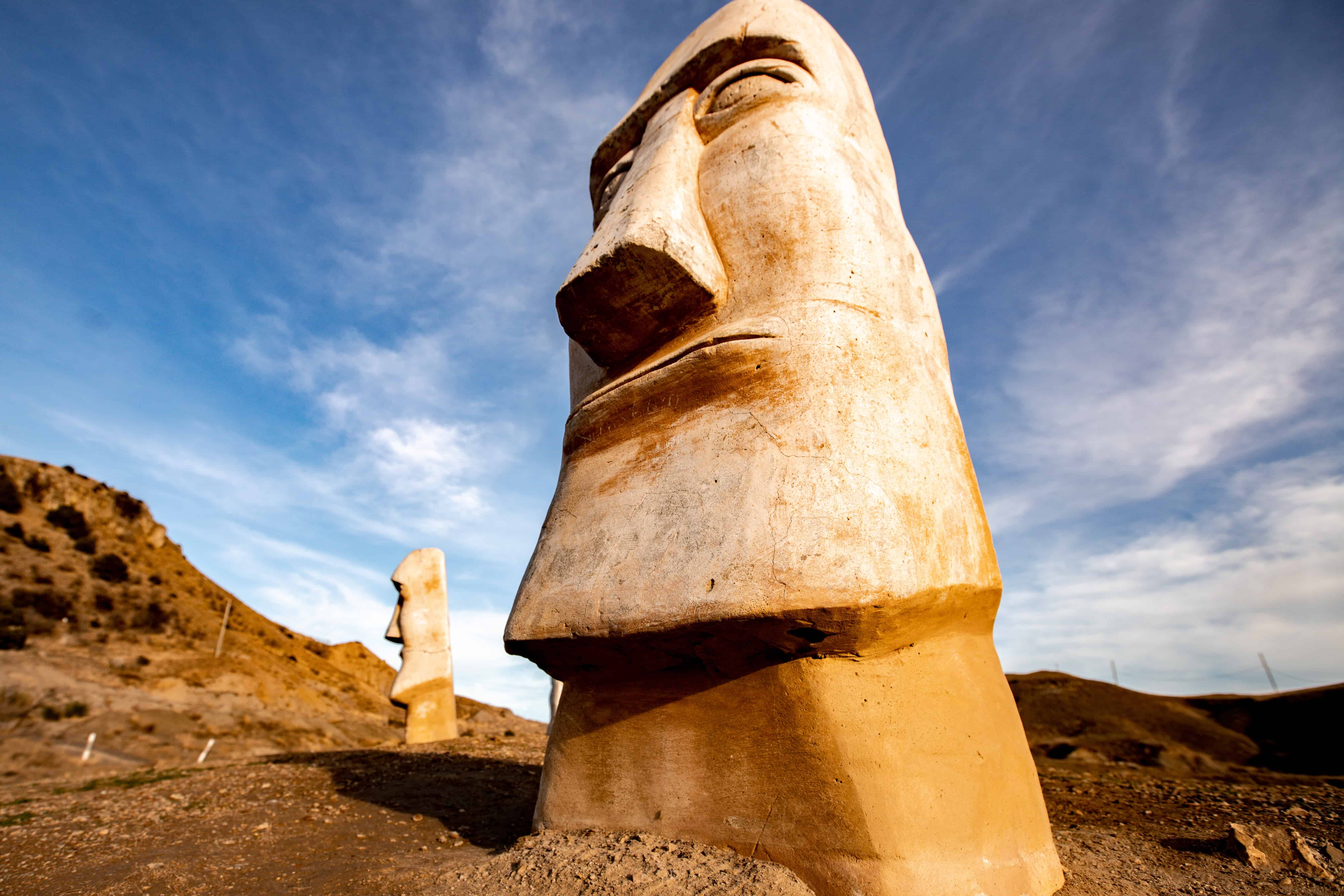 A close up picture of a moai statue
