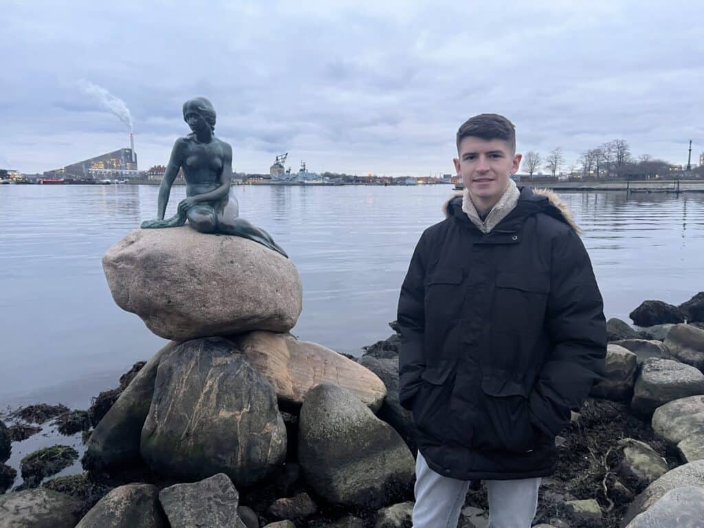 A picture of me at the Little Mermaid statue in Copenhagen in January. 